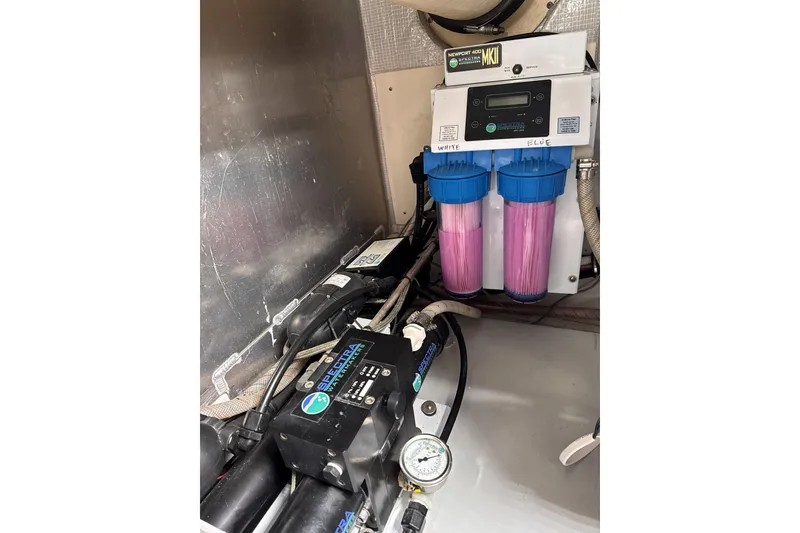 Slide: The Image of Water filtration system in a 2007 American Tug 41 boat engine room. - 22