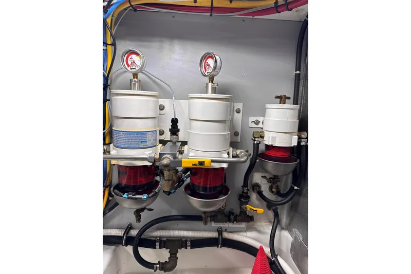 Slide: The Image of Engine room of 2007 American Tug 41 with fuel filtration system and gauges. - 23