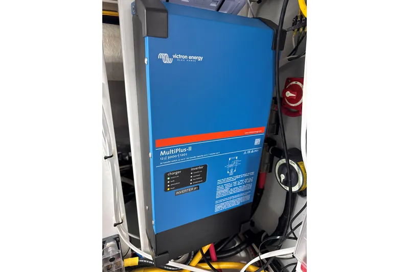 Slide: The Image of Victron Energy MultiPlus-II inverter in 2007 American Tug 41 boat, installed with cables. - 25