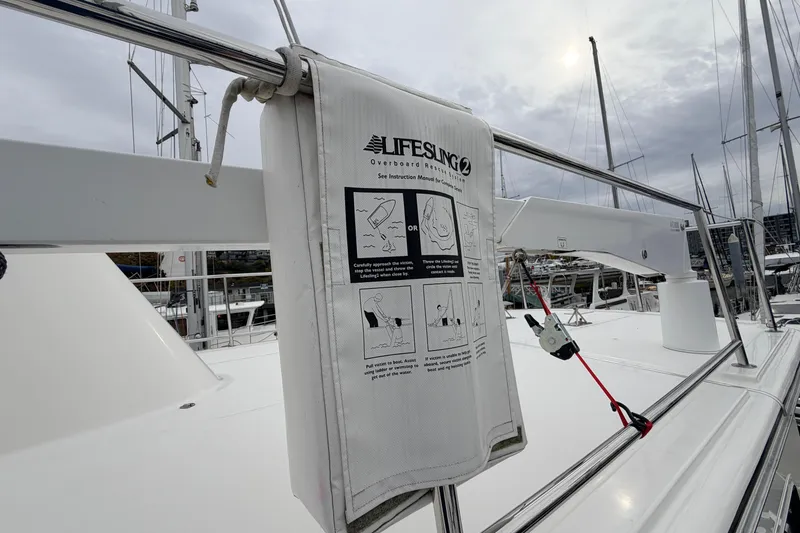 Slide: The Image of Lifesling on 2007 American Tug 41 yacht, docked with overcast sky. - 40