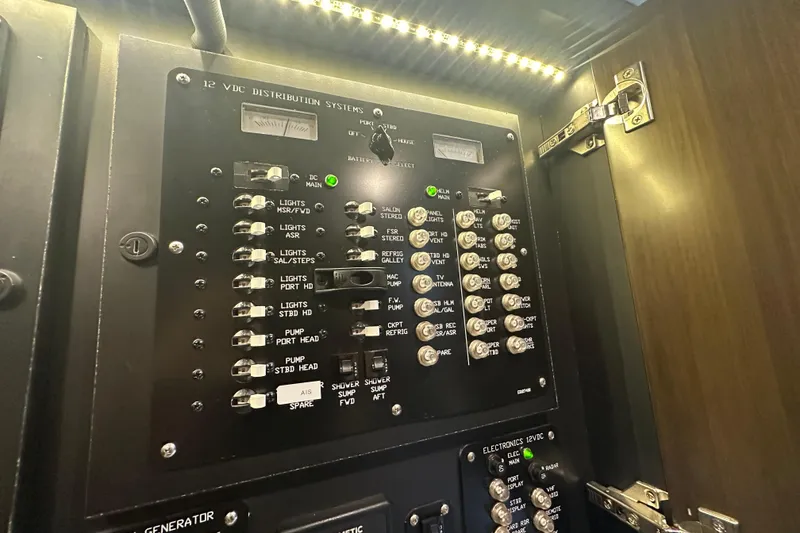 Slide: The Image of Electrical panel of 2022 Cruisers Yachts 42 Cantius, featuring 12V DC distribution system. - 36