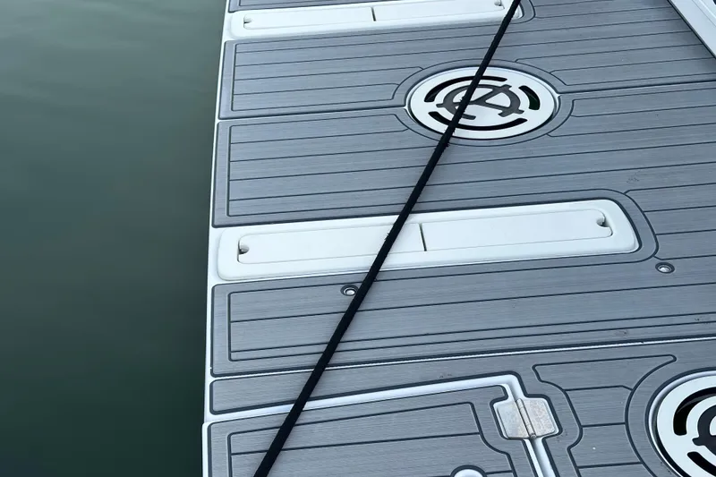 Slide: The Image of 2022 Cruisers Yachts 42 Cantius deck with sleek design and black rope. - 42