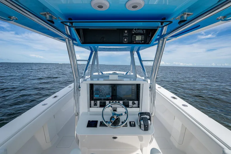 Slide: The Image of Center console of a 2015 Bahama 41 boat with ocean view. - 17