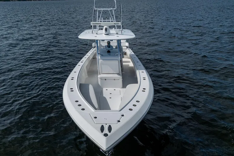 Slide: The Image of 2015 Bahama 41 boat's overhead view with stainless steel rod holders and LED lights. - 34