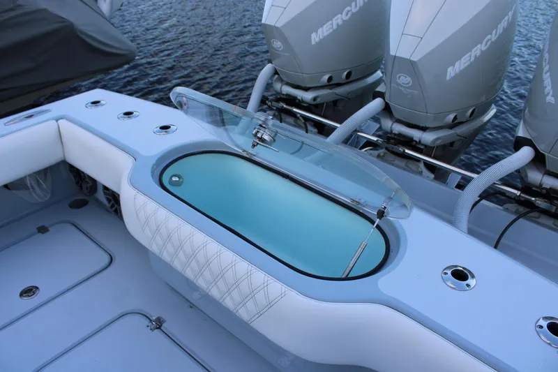 Slide: The Image of 2019 Conch 33 boat with livewell and multiple Mercury outboard engines. - 21