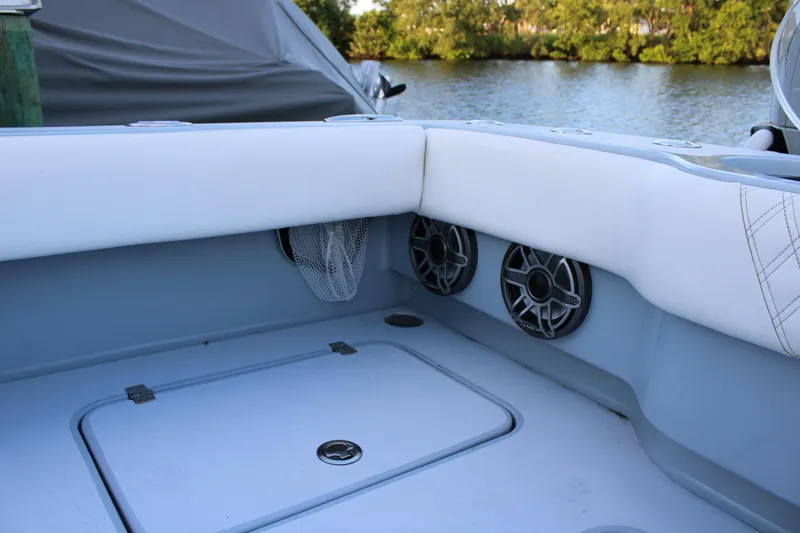 Slide: The Image of Interior of 2019 Conch 33 boat with speakers and storage compartment. - 22