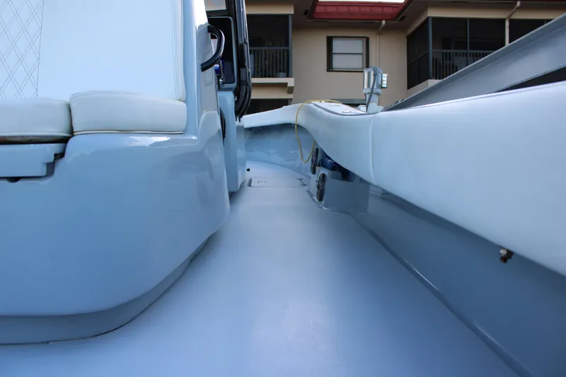 Slide: The Image of Interior view of a 2019 Conch 33 boat, showcasing sleek seating and modern design. - 8