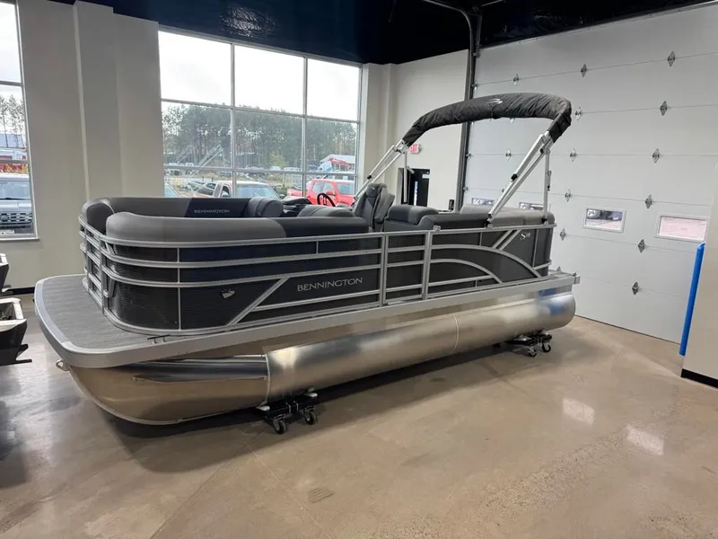 Slide: The Image of 2026 Bennington 188SL pontoon boat in showroom. - 10