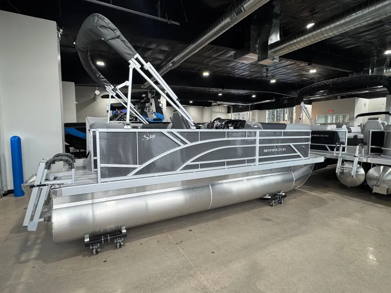 Slide: The Image of 2026 Bennington 188SL pontoon boat in showroom. - 11