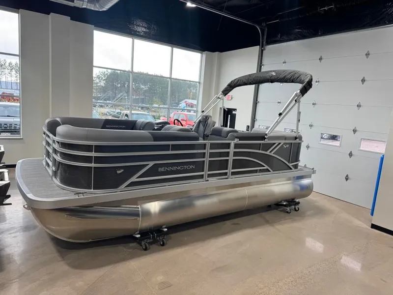 Slide: The Image of 2026 Bennington 188SL pontoon boat in showroom. - 13