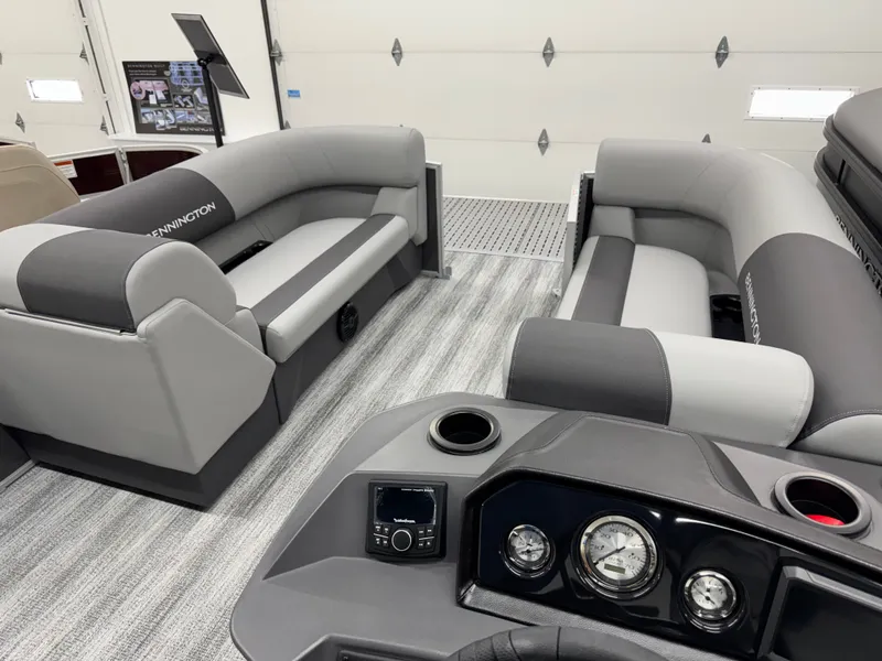 Slide: The Image of Interior of 2026 Bennington 188SL with gray seating and dashboard. - 14