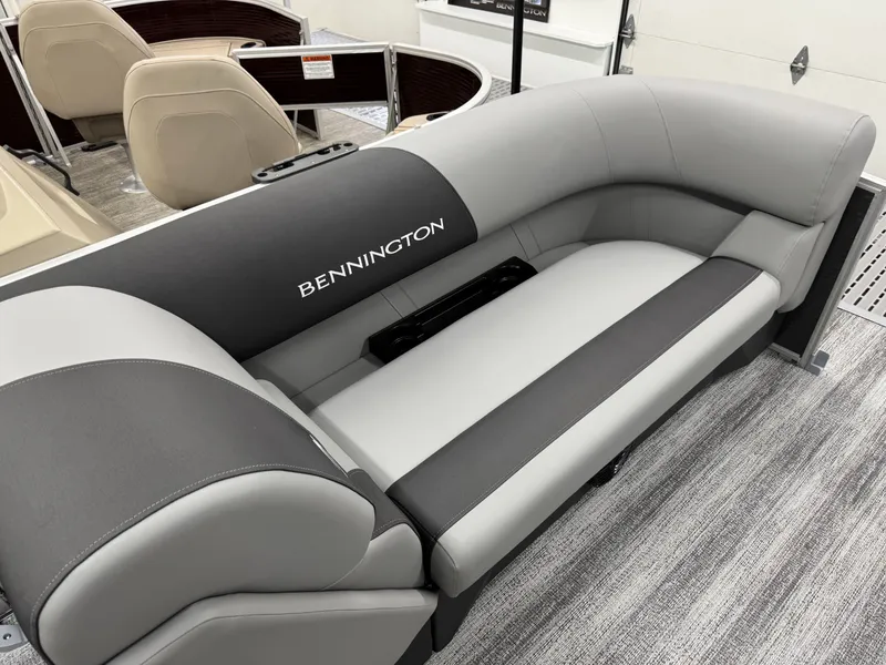 Slide: The Image of Interior of 2026 Bennington 188SL with gray upholstered seating. - 15