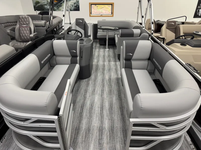 Slide: The Image of Interior of 2026 Bennington 188SL pontoon boat with gray seating. - 17