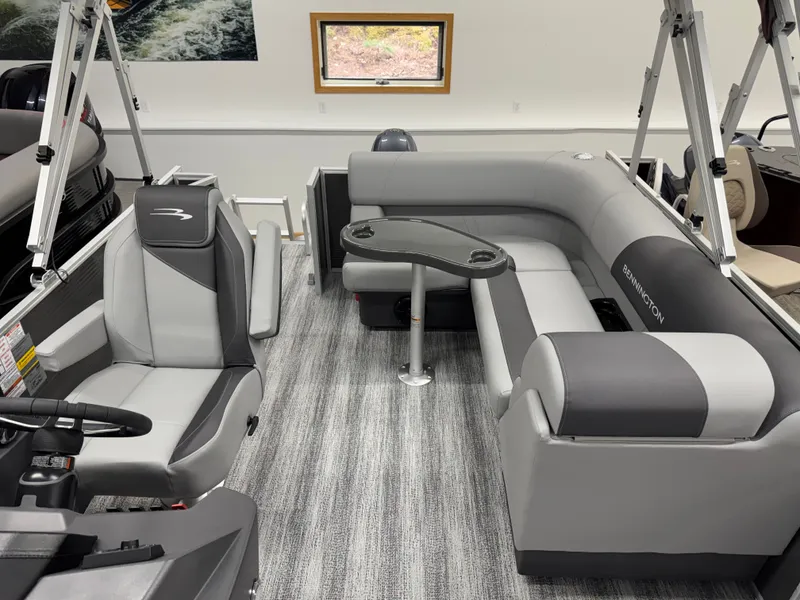 Slide: The Image of Interior of 2026 Bennington 188SL pontoon boat with gray seating. - 18