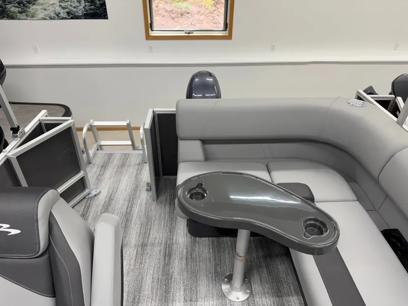 Slide: The Image of Interior of Bennington 188SL pontoon boat, gray seating, table with cup holders. - 24