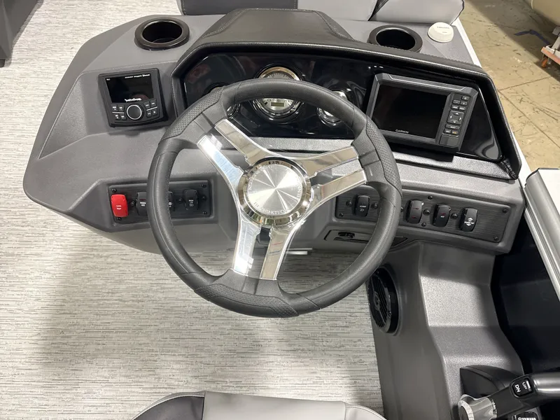 Slide: The Image of Interior view of Bennington 20SL 2026 helm with steering wheel and controls. - 11