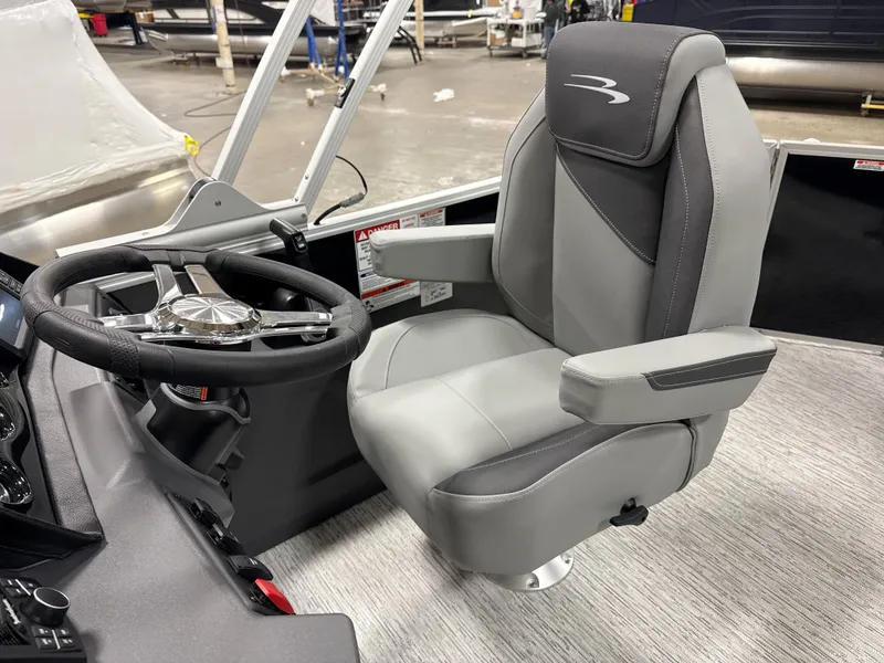 Slide: The Image of Interior of 2026 Bennington 20SL with gray helm seat. - 12