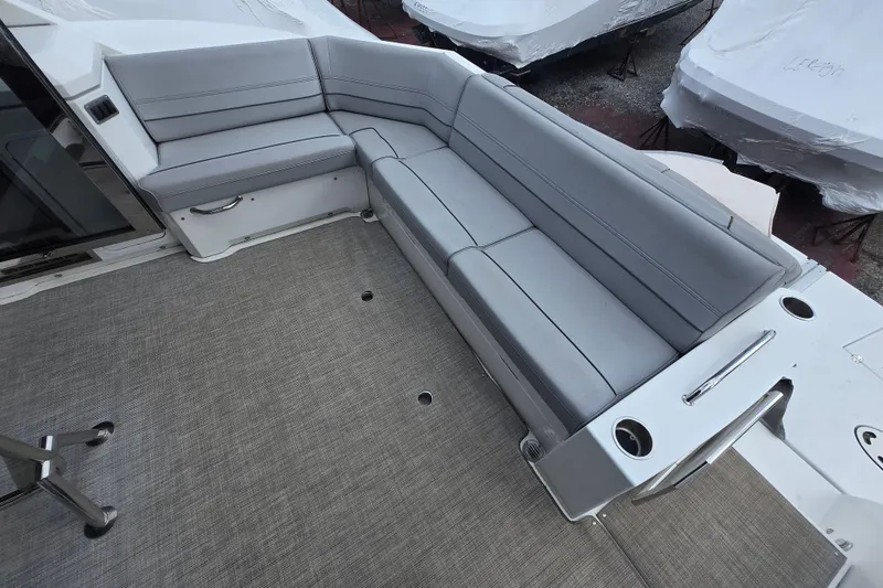 Slide: The Image of Interior of 2016 Cruisers Sport Series 45 Cantius yacht with modern seating and TV. - 11