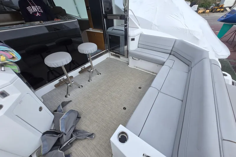 Slide: The Image of 2016 Cruisers Sport Series 45 Cantius helm with dual screens and modern controls. - 14
