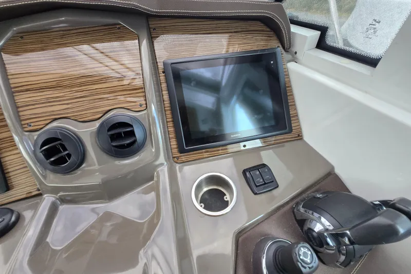 Slide: The Image of Control panel of 2016 Cruisers Sport Series 45 Cantius with joystick and throttle levers. - 37
