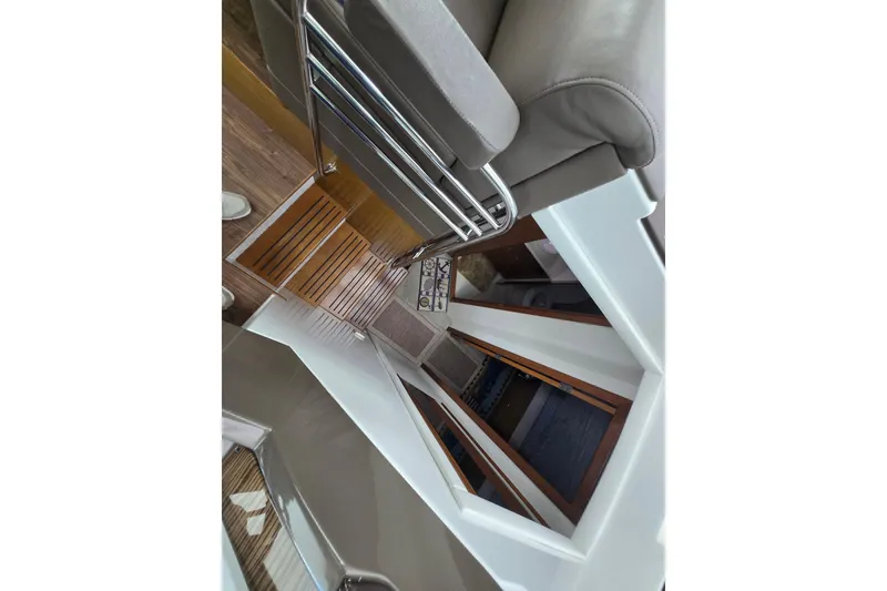 Slide: The Image of 2016 Cruisers Sport Series 45 Cantius helm with control panel and Garmin display. - 38