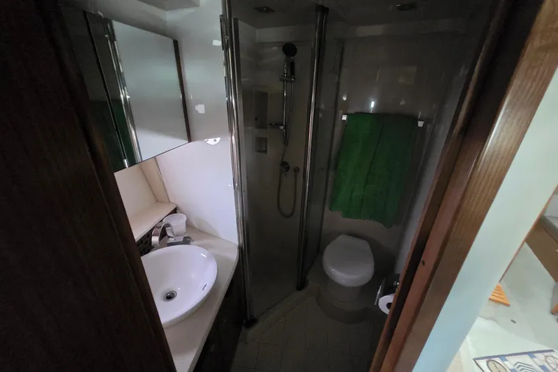 Slide: The Image of Interior view of 2016 Cruisers Sport Series 45 Cantius yacht, featuring sleek design and wood flooring. - 40