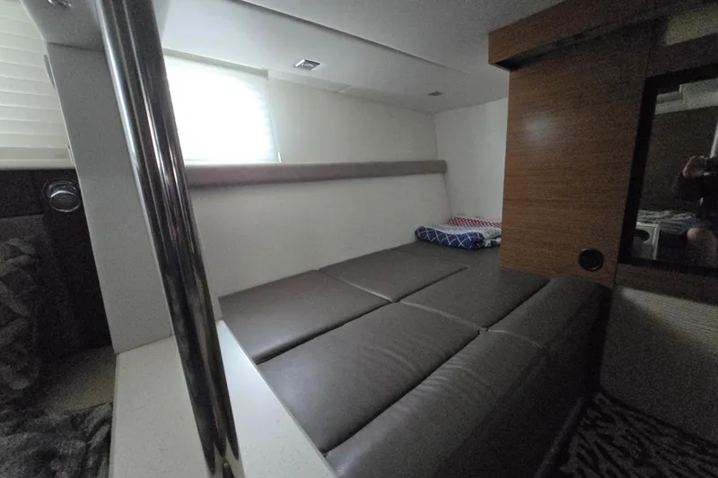 Slide: The Image of Bathroom interior of 2016 Cruisers Sport Series 45 Cantius yacht, featuring shower and green towel. - 44