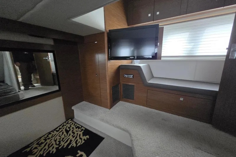Slide: The Image of Luxurious cabin interior of 2016 Cruisers Sport Series 45 Cantius yacht, featuring cozy bedding. - 45