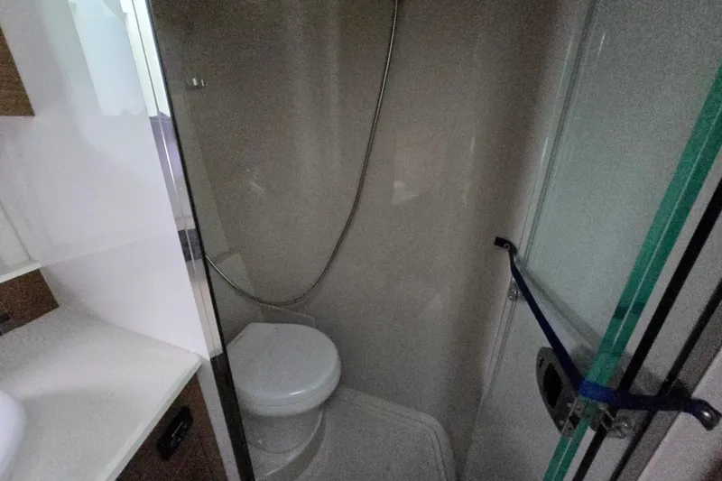 Slide: The Image of Interior of 2016 Cruisers Sport Series 45 Cantius yacht, featuring bathroom and cabin. - 51