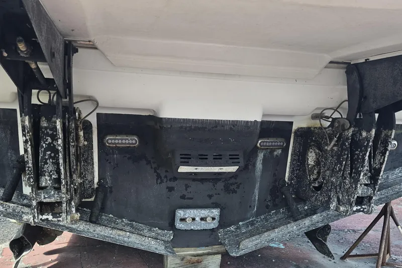 Slide: The Image of Engine room of 2016 Cruisers Sport Series 45 Cantius with fire extinguisher and machinery. - 62