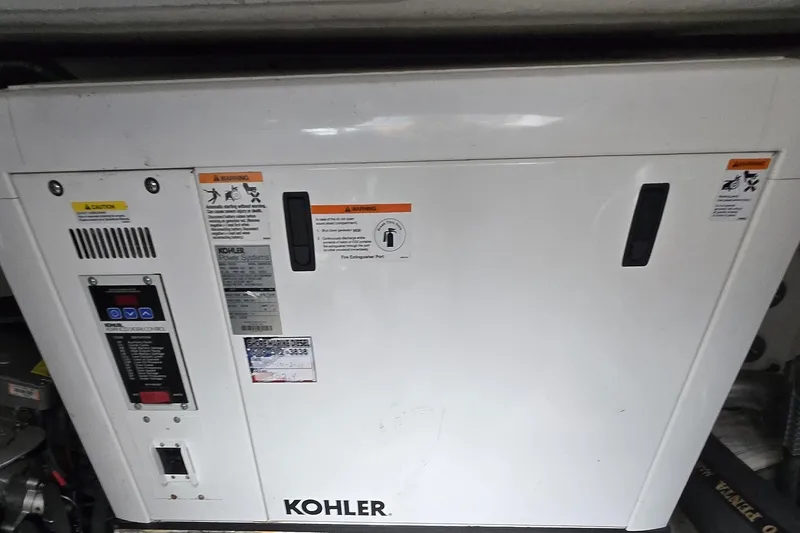 Slide: The Image of Engine room of 2016 Cruisers Sport Series 45 Cantius yacht, showing mechanical components. - 75