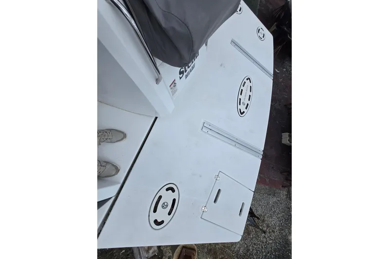 Slide: The Image of 2016 Cruisers Sport Series 45 Cantius boat deck with cover, featuring sleek design elements. - 76