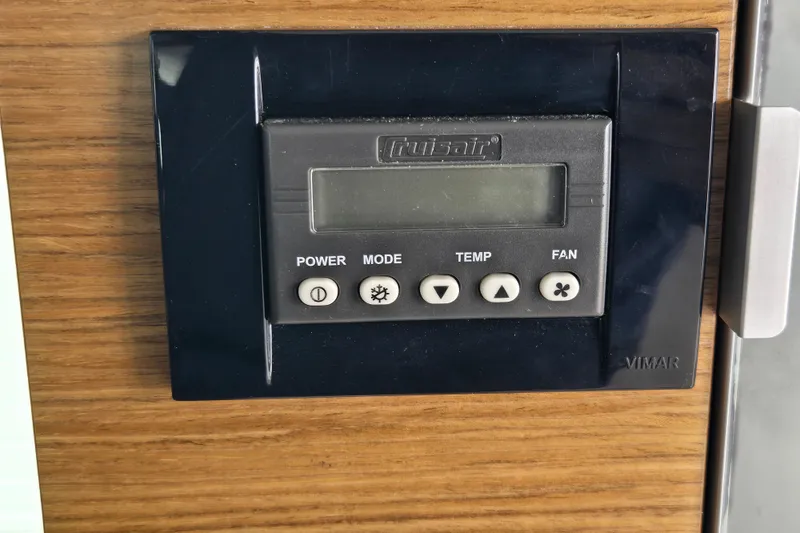 Slide: The Image of Control panel of 2016 Cruisers Sport Series 45 Cantius boat, featuring dockside breaker and connections. - 80