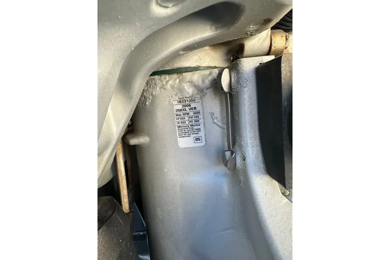 Slide: The Image of Label on 2006 Southport 26 Center Console engine, showing specifications and serial number. - 10