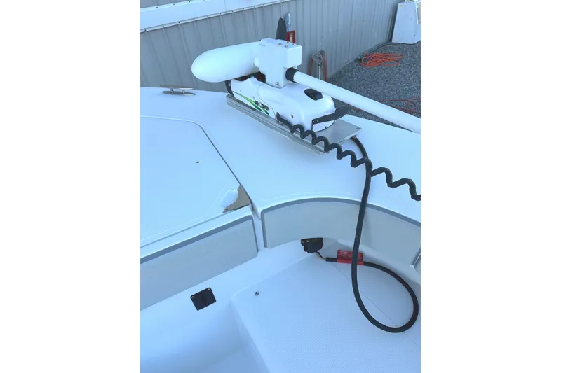Slide: The Image of 2006 Southport 26 Center Console boat with mounted trolling motor. - 15