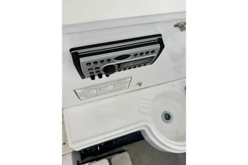 Slide: The Image of 2006 Southport 26 Center Console boat control panel and sink detail. - 22