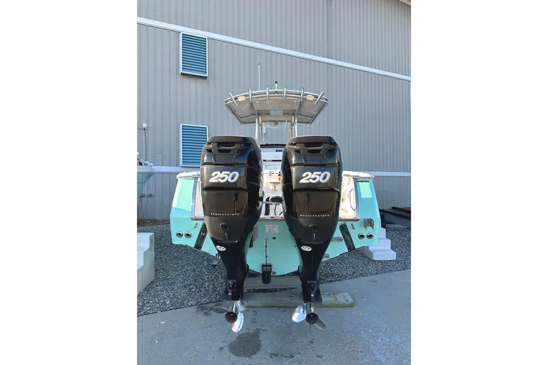 Slide: The Image of 2006 Southport 26 Center Console boat with twin 250 horsepower engines. - 4