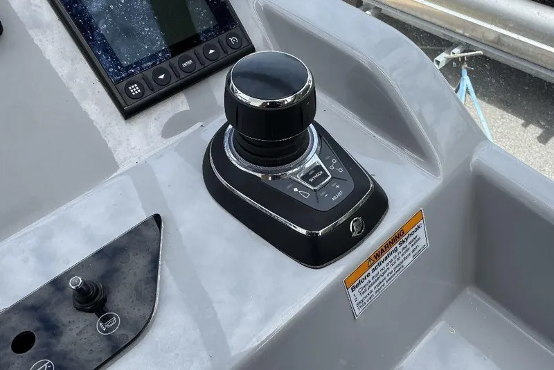 Slide: The Image of Control panel of 2024 Beneteau Flyer 10 boat with joystick and display. - 15