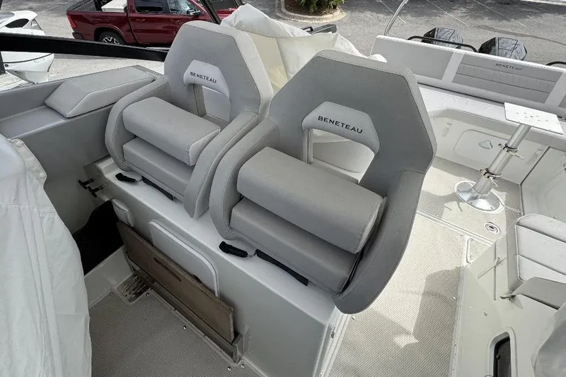 Slide: The Image of 2024 Beneteau Flyer 10 boat interior with plush seating and modern design. - 8