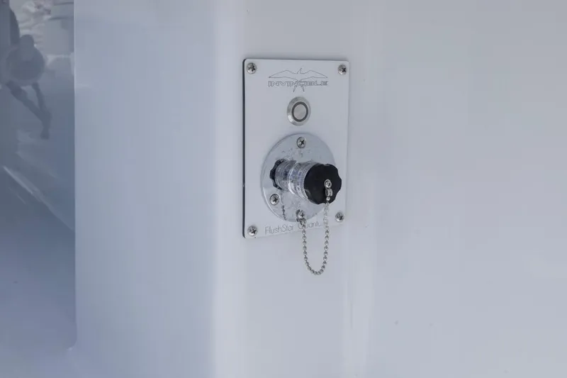 Slide: The Image of Flush system on 2026 Invincible 36 Catamaran, featuring a secure cap and chain. - 45