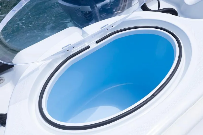 Slide: The Image of Open hatch on 2026 Invincible 36 Catamaran, showcasing interior storage space. - 51