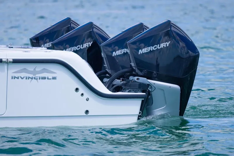 Slide: The Image of 2026 Invincible 36 Catamaran with Mercury engines on water. - 6