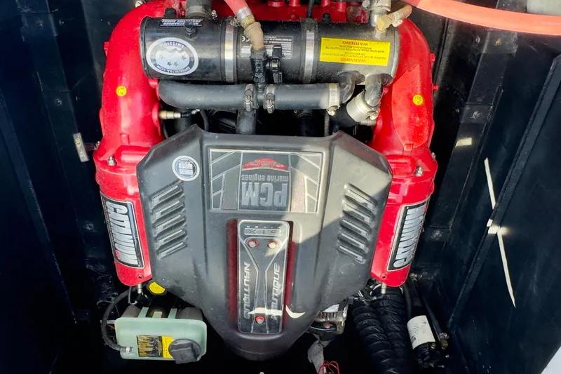 Slide: The Image of 2015 Nautique Super Air Nautique G25 Coastal Edition engine, featuring PCM components. - 18