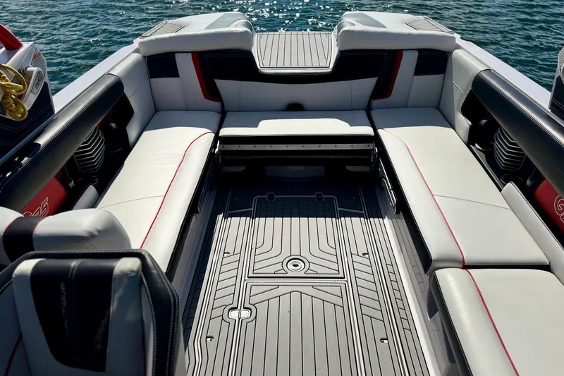 Slide: The Image of 2015 Nautique Super Air Nautique G25 Coastal Edition interior with spacious seating and sleek design. - 20