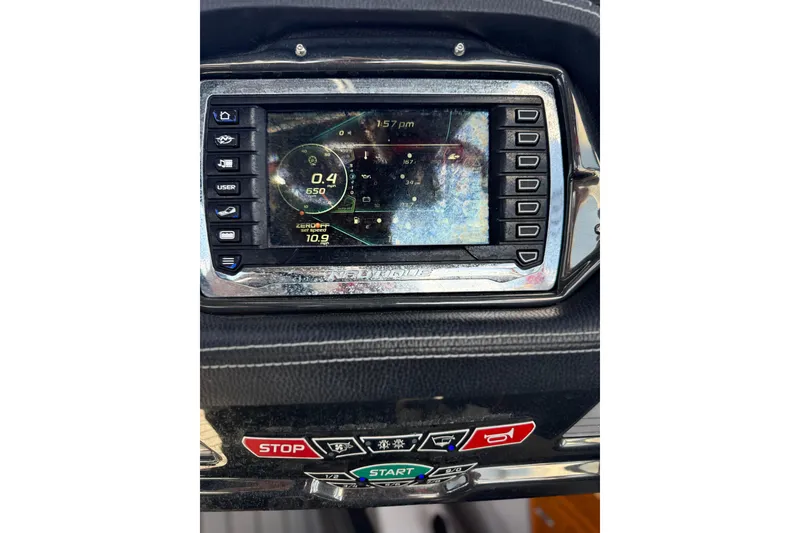 Slide: The Image of Dashboard of 2015 Nautique Super Air Nautique G25 Coastal Edition boat. - 5