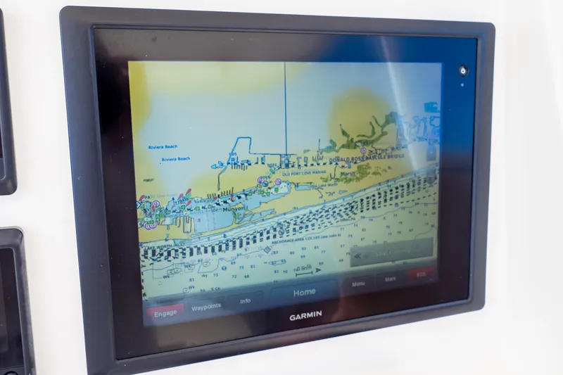 Slide: The Image of Garmin navigation display on 2015 Intrepid 327 Cuddy boat showing coastal map. - 16
