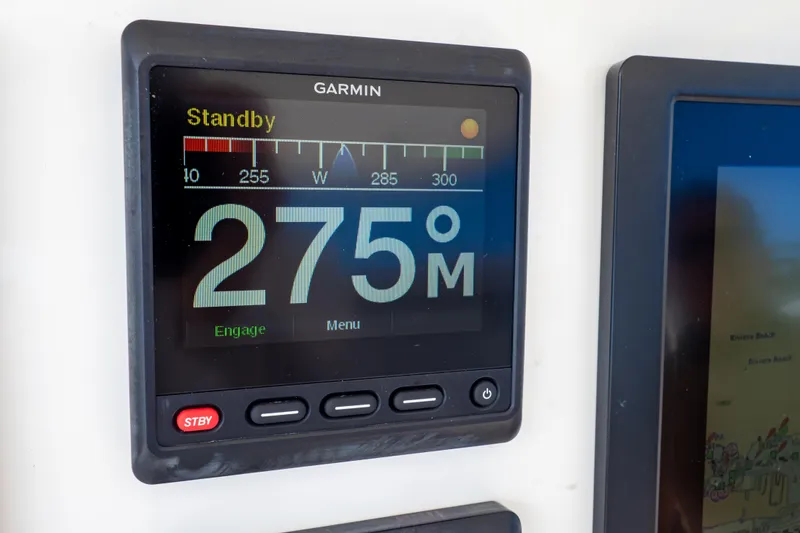 Slide: The Image of Garmin navigation display on 2015 Intrepid 327 Cuddy showing 275° heading. - 19