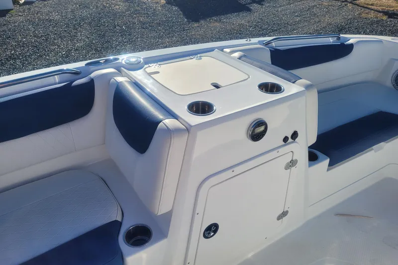 Slide: The Image of 2017 Tahoe 2150 boat interior with seating and storage compartments. - 13