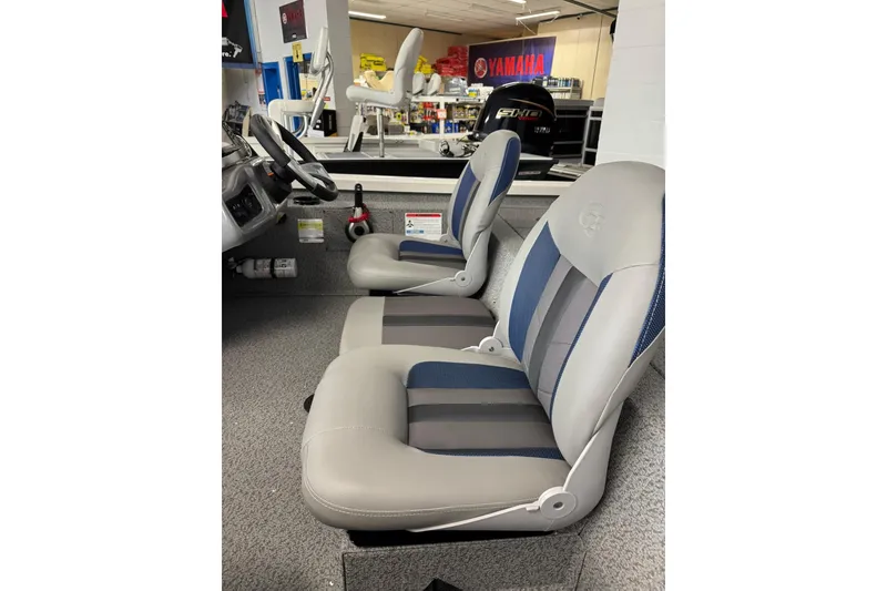 Slide: The Image of 2025 G3 Sportsman 1610 boat interior with gray and blue seating. - 4
