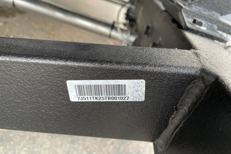 Slide: The Image of Barcode on 2026 Tracker Targa V-19 WT boat frame, displaying serial number. - 88